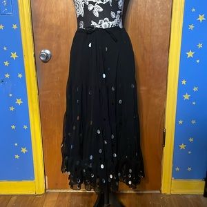 Large black skirt with hanging sequins